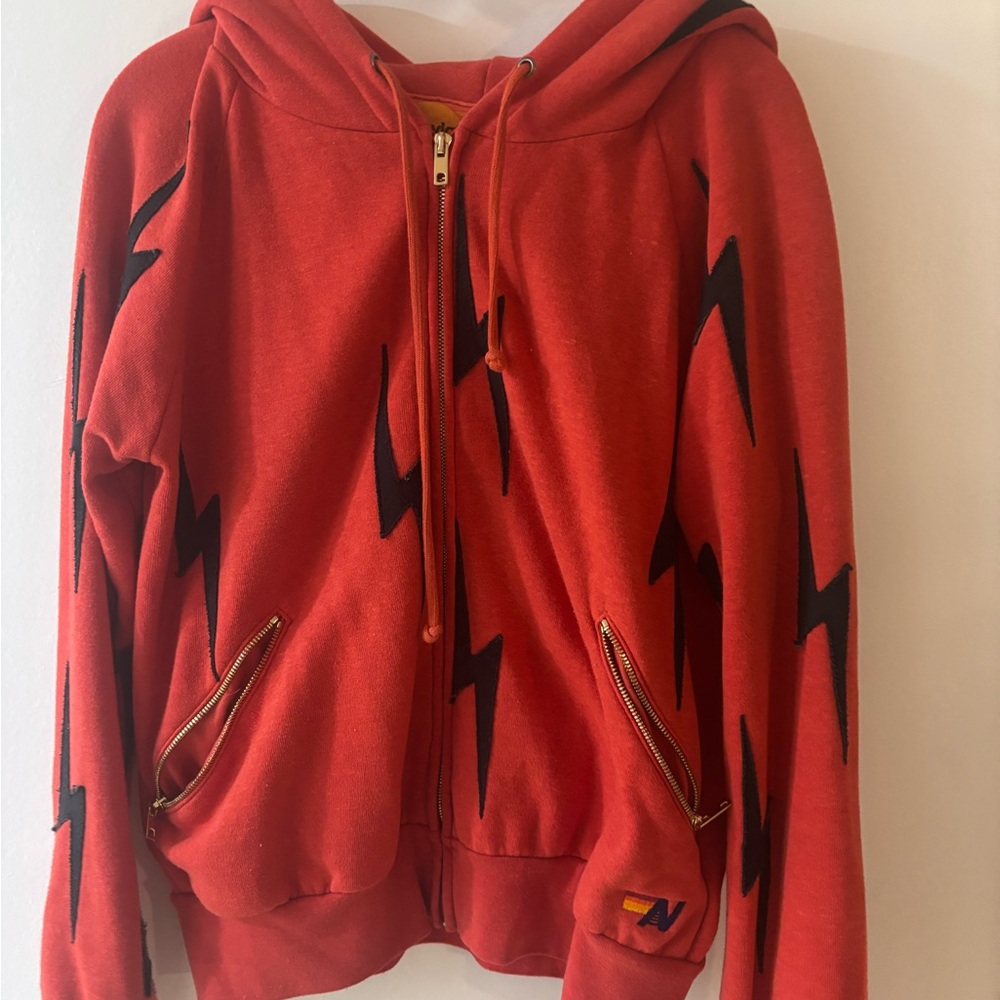 Red Hoodie with Black Lightning Bolts